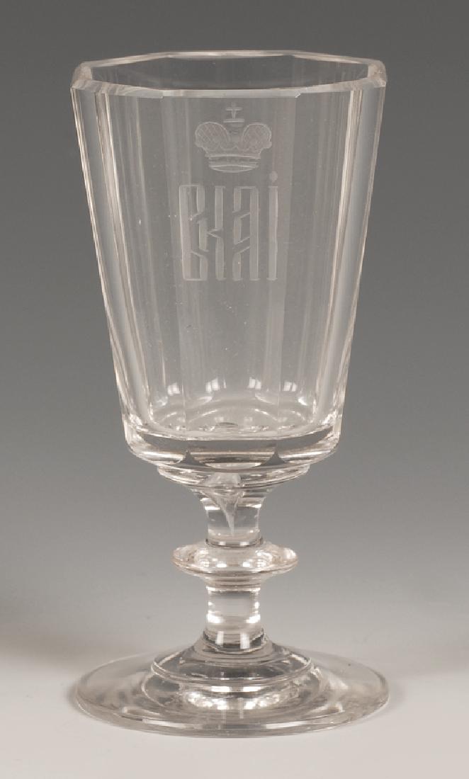 Liqueur glass GD Alexandra Iosifovna: A liqueur glass from the Banqueting Service of Grand Duchess Alexander Iosifovna, Imperial Glassworks, circa 1850. Mouthblown and wheelengraved, the faceted bowl engraved with the Grand Duchess' Imper
