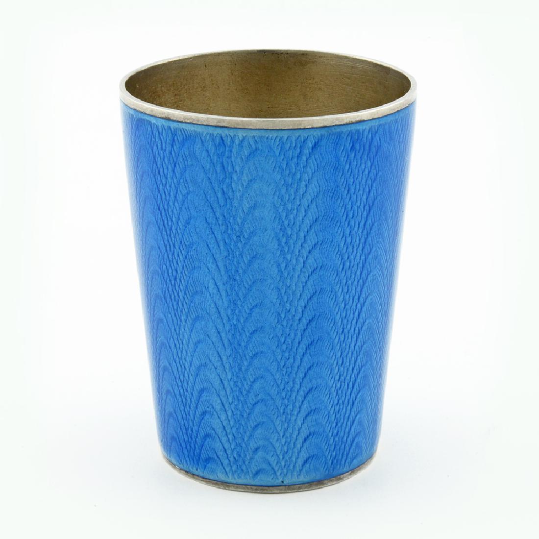 Russian antique silver & guilloche enamel shot glass: A Russian silver gilt and guilloche enamel beaker, Grachev Brothers, St. Petersburg, 1899-1903. Of tapering form enameled translucent cerulean blue over a wavy engine turned ground, gilt interior.