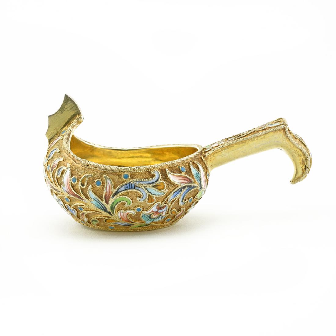 Agafonov shaded cloisonne enamel kovsh: A Russian silver gilt and shaded cloisonne enamel kovsh, Vasily Agafonov, Moscow, 1908-1917. Of traditional form, the exterior enameled with multi-color scrolling floral and foliate motifs against a s