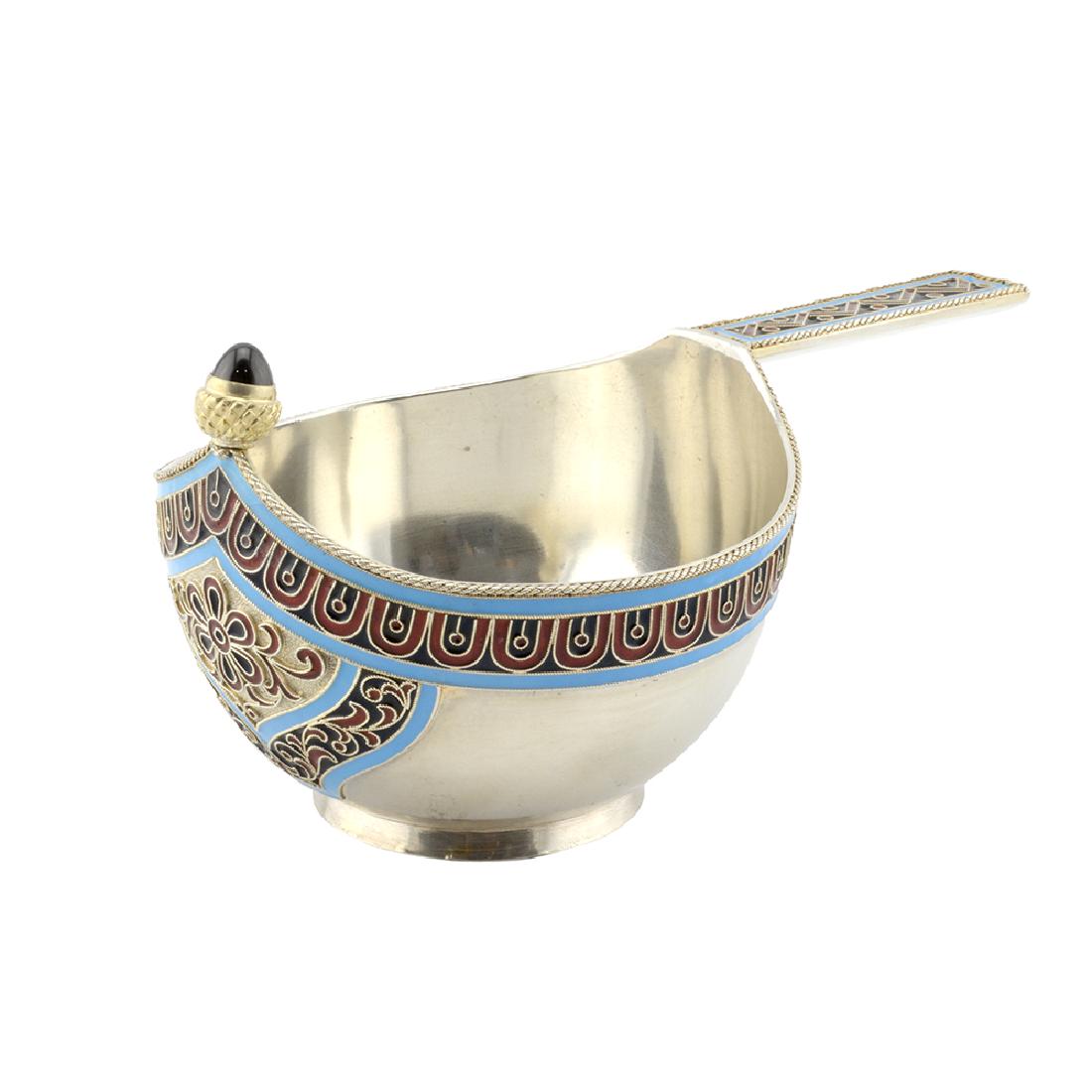 Russian Grachev Enamel kovsh set with 1891 ruble coin: A Russian parcel gilt and cloisonne enamel kovsh, Grachev Brothers, St Petersburg, 1899-1904. The base set with an 1891 Alexander III ruble, the upper border of the exterior enameled with a row of lap