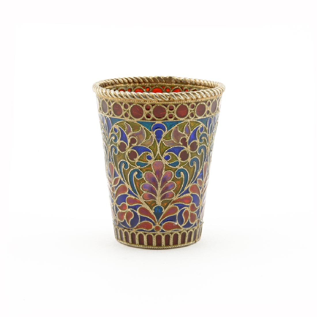 Pavel Ovchinnikov Plique-a-Jour Enamel Beaker: A Russian gilded silver and plique-a-jour enamel beaker, Ovchinnikov, Moscow, circa 1899-1908. Tapering cylindrical, decorated with brightly-colored floral and foliate designs within beaded and lappet