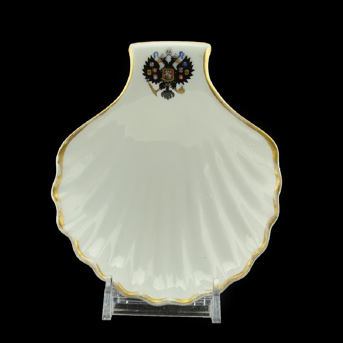 Oyster dish from the Coronation Service of Alexander: A Russian porcelain oyster dish from the Alexander III Coronation Service, Imperial Porcelain Factory, St. Petersburg, period of Nicholas II (1894-1917), dated 1913. Molded as scalloped shell, Of sca