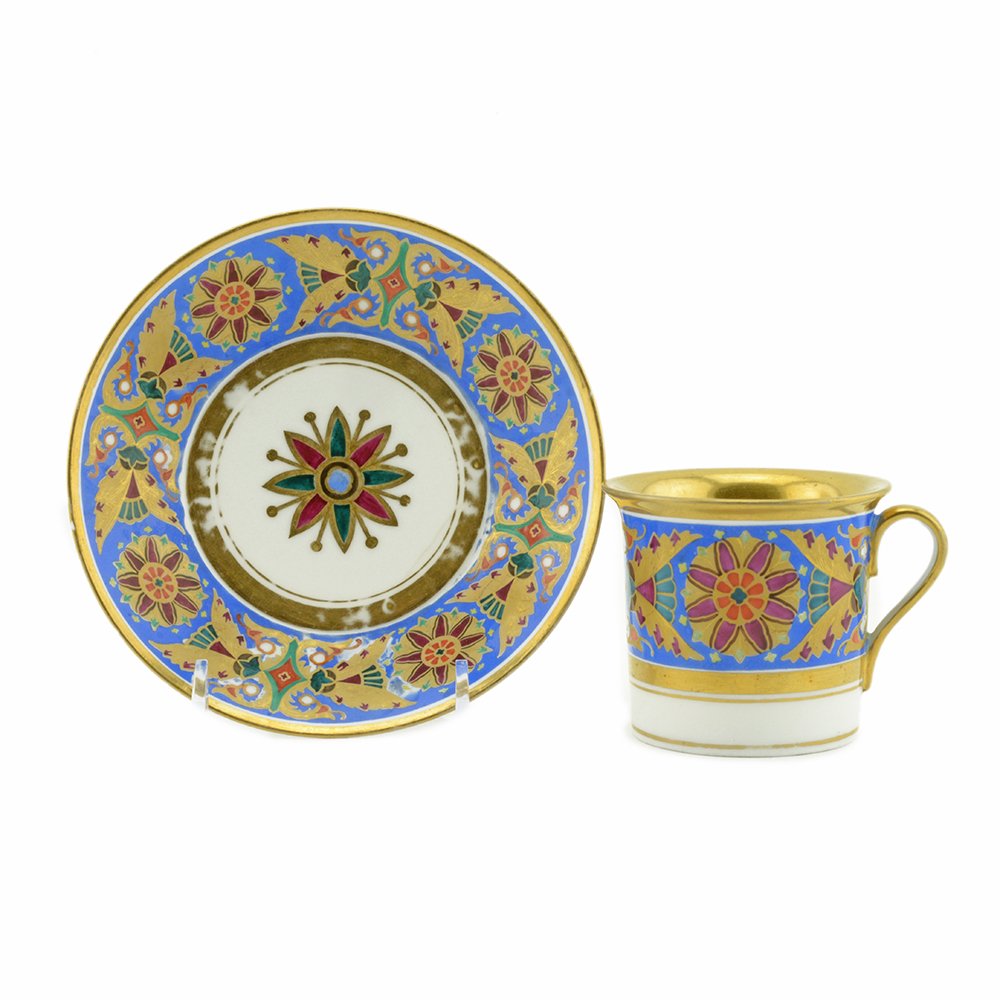 Imperial Porcelain Factory Cup & Saucer Gothic Service: A Russian porcelain cup and saucer from the Gothic Service, Imperial Porcelain Factory, St. Petersburg, periods of Alexander II (1881-1894) and Nicholas II (1894-1918). The cup and saucer with brightl