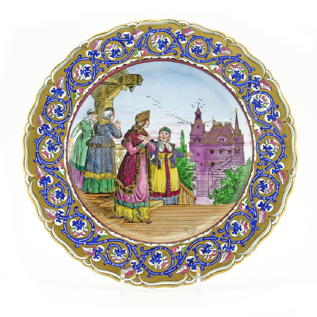 A Russian faience plate Kuznetsov Factory: A Russian faience plate with scene from the bylina in.Solovey Budimirovich,in. M.S. Kuznetsov Factory in Tver, 1870s-1880s. The shaped plate centered with a scene of a young woman looking at a beautif