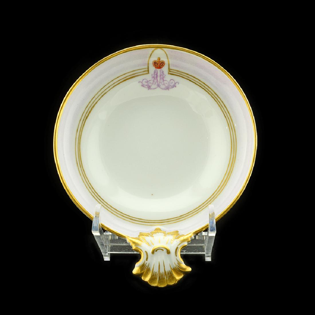 Oyster dish from Grand Duke Alexander Alexandrovich: A Russian porcelain oyster dish from the service of Grand Duke Alexander Alexandrovich (Alexander III), Imperial Porcelain Factory, St. Petersburg. Dated 1915. 4 3/4 in. x 5 7/8 in.