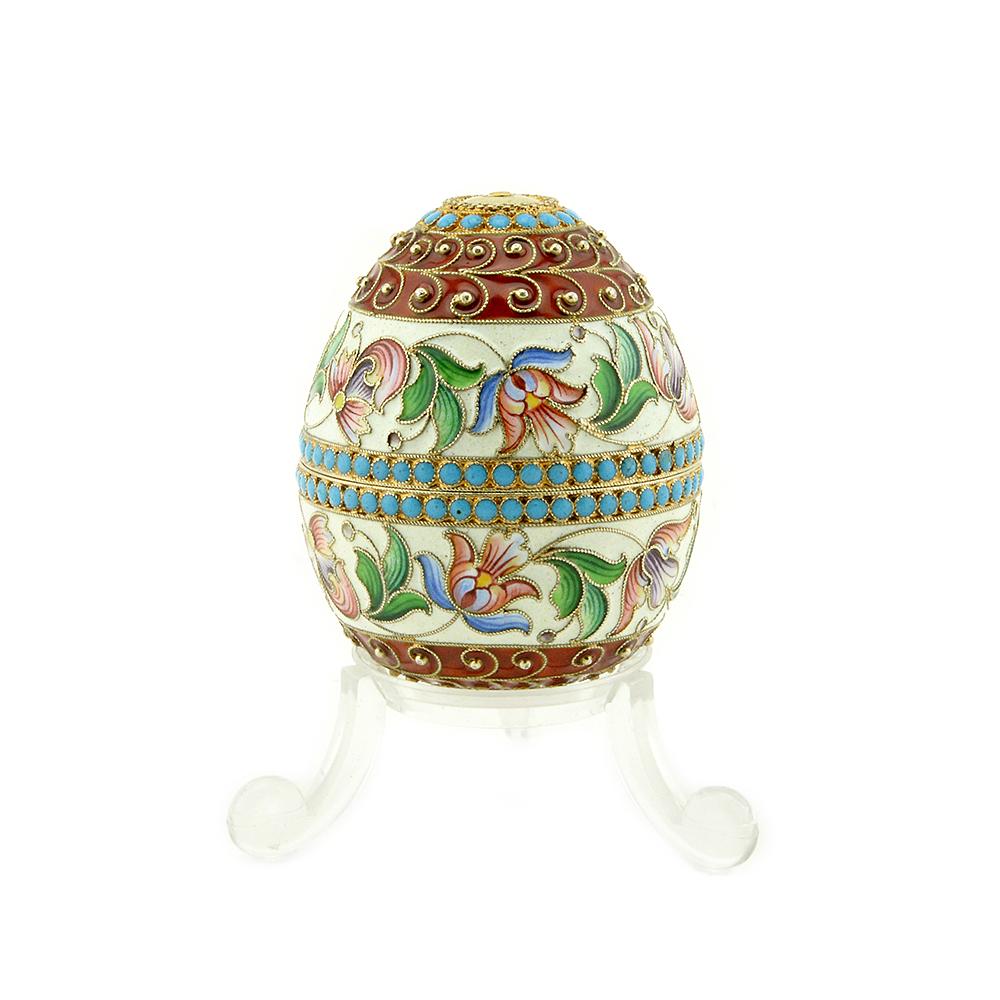 Nikolai Alekseev Enamel Egg: A Russian silver gilt & shaded cloisonne enamel egg that separates to form a pair of egg cups, Nikolai Alekseev, Moscow, 1899-1908. The two-part egg separating to form a pair of egg cups, the exterior