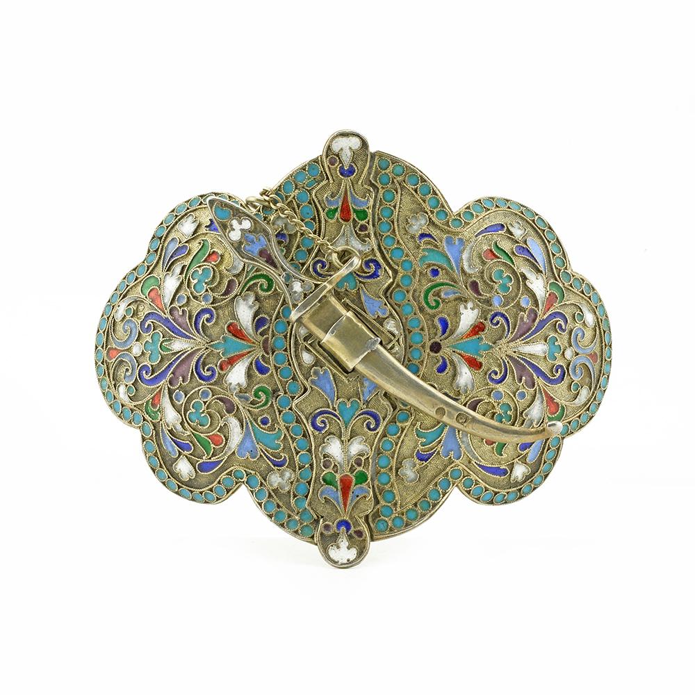 Antique Russian silver gilt and enamel belt buckle: A Russian silver gilt and cloisonne enamel belt buckle, Lebedkin, Moscow 1898-1914. Size 3.3". length (8.5 cm). Condition: Buckles are soldered together.