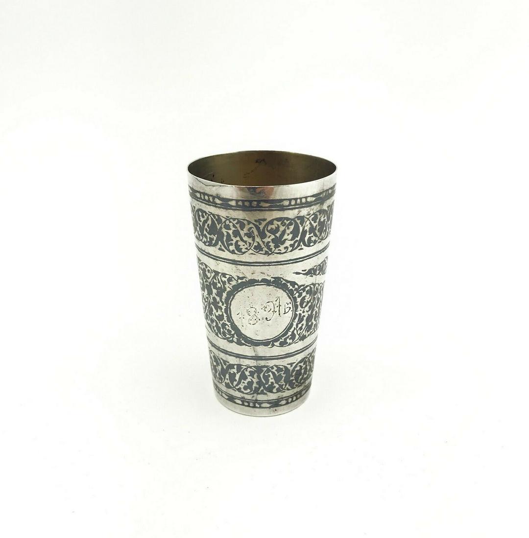 A Russian silver niello cup: A Russian silver niello cup, marked 875 Silver standard. Circa 1891. Size: 3 1/8 h