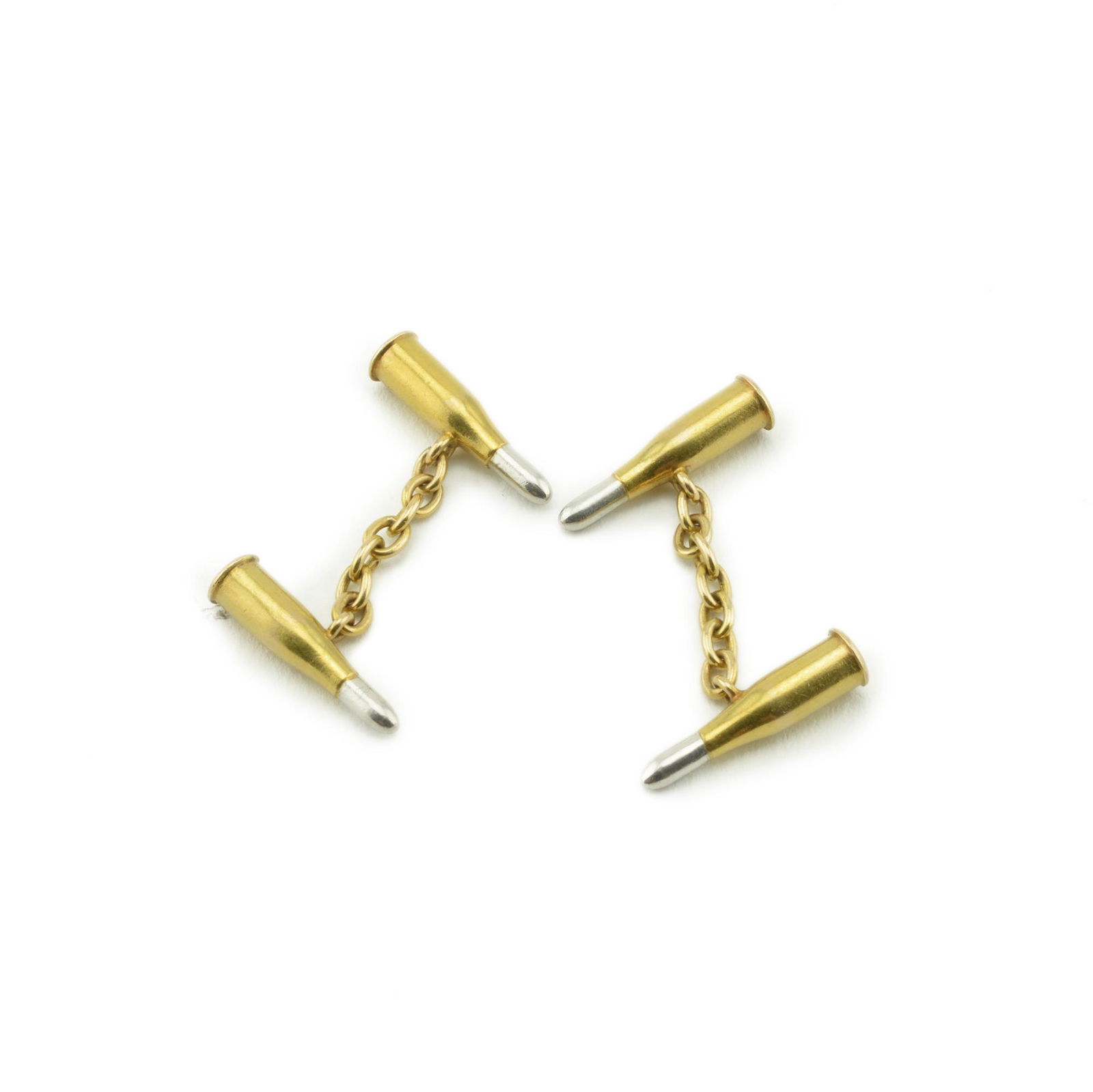 Pair of Russian bullet double cufflinks: A pair of Imperial Russian double cufflinks, designed in the form of bullets / cartridges, 18k gold and platinum, set with rose-cut diamonds. Indistinct marks. Unknown jeweler, probably Russian, early