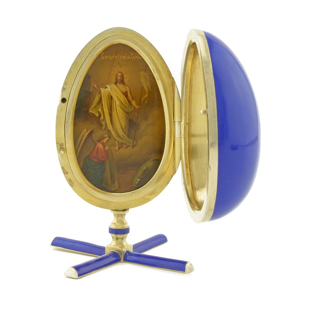 An exceptional & unusual Russian silver gilt & champlevÃ© enamel icon egg: An exceptional & unusual Russian silver gilt & champleve enamel icon egg, made by Alexander Petrov for Grachev Brothers, St. Petersburg, prior to 1899. Ovoid in shape, mounted on its original silver &