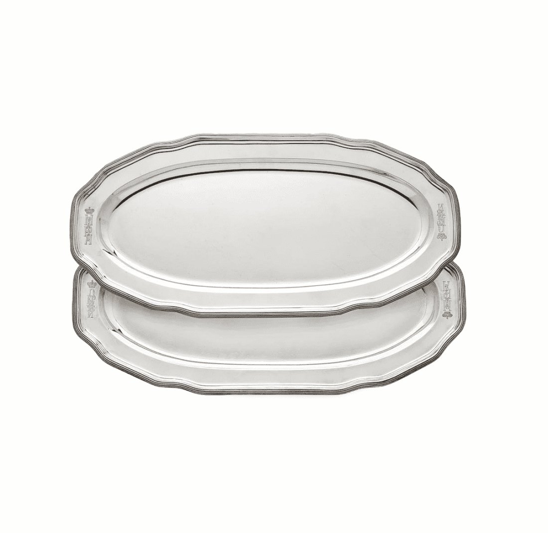 A pair of Russian silver fish service trays, Grachev: A pair of silver fish service trays, Grachev, St. Petersburg, 1884. Each engraved "Grand Duke Sergei" and â€œGrand Duchess Maria" beneath Russian Imperial Crowns. 22 inch length x 10 1/2 inch widt