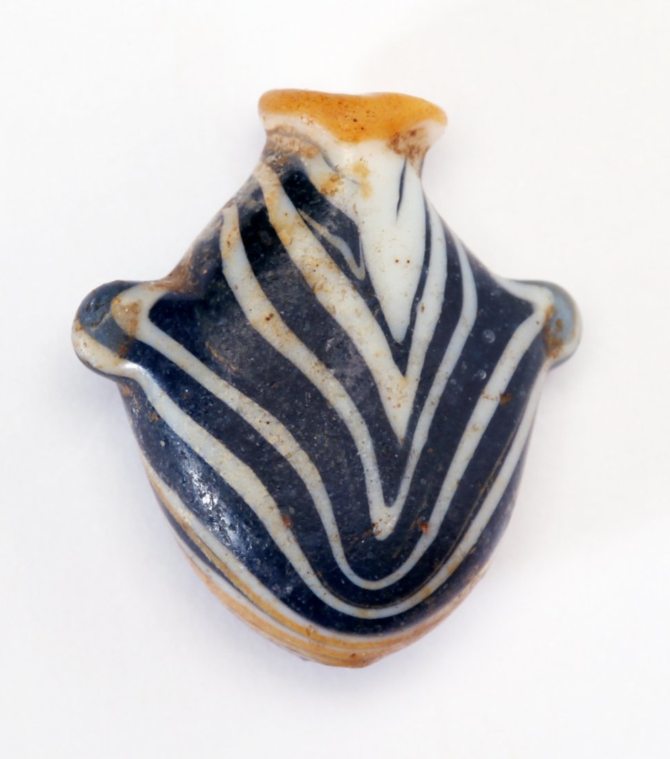 A Rare Egyptian Core-Formed Glass Heart Bead (1 of 2)