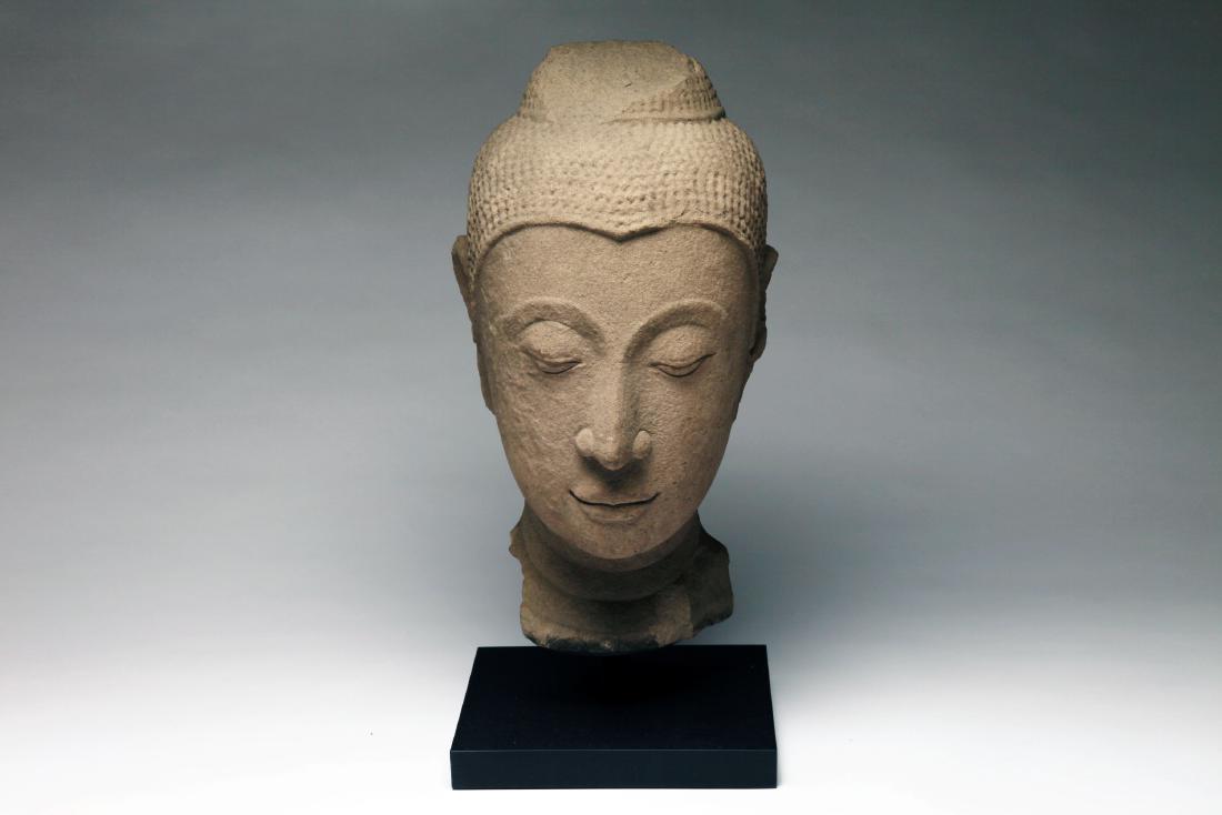 A Colossal Thai Stone Head of Buddha (1 of 2)