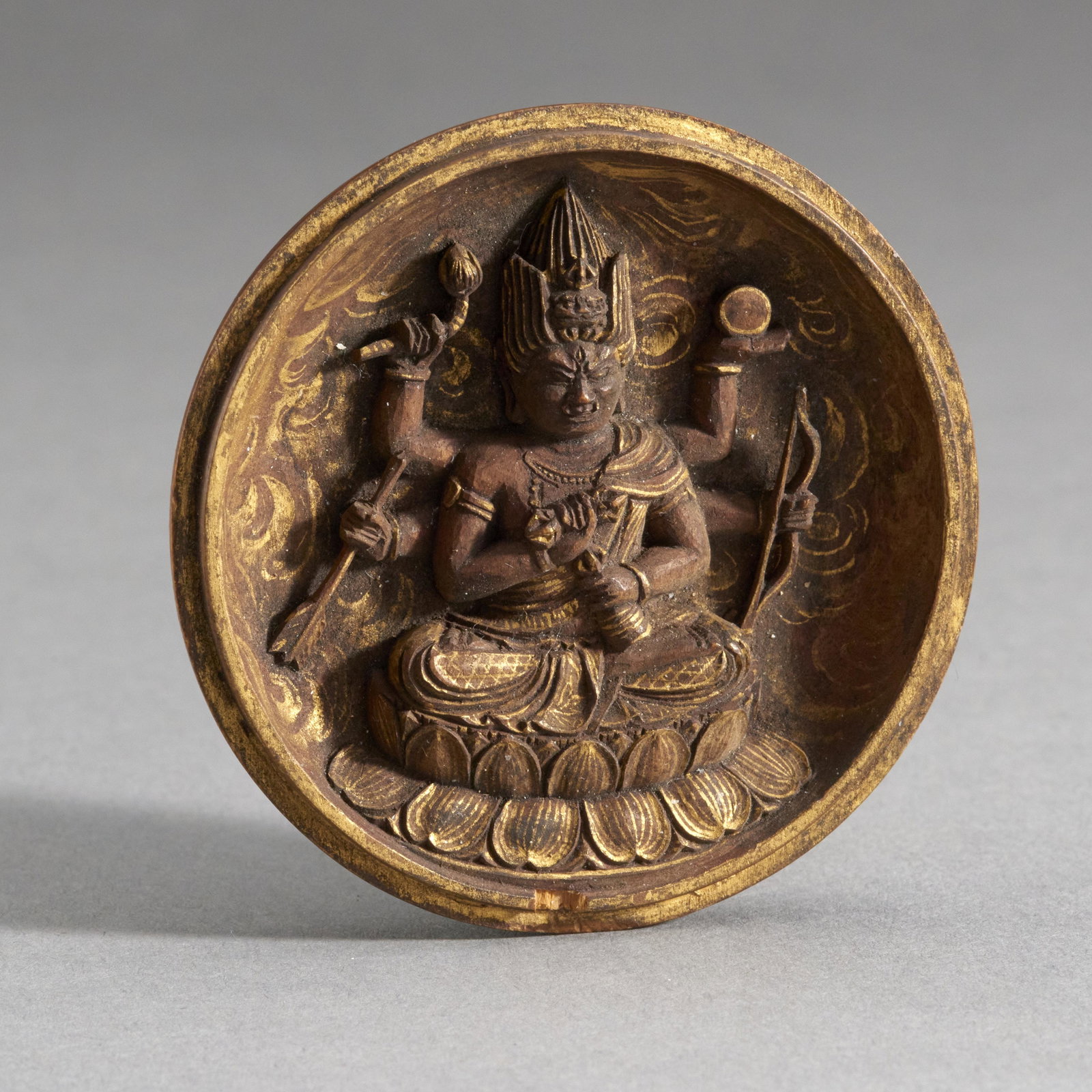 Exquisite Japanese Zushi: Japan, Edo Period. The bottom half of a pocket Zushi, a small, extremely fine depiction of a six-armed deity, Aizan Myoo, the wisdom king of passion. Beautifully carved in minute detail with gilded ac