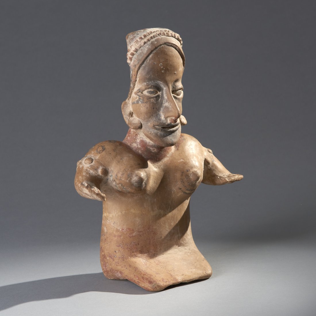 Pre-Columbian Figure: Western Mexico, ca. 200-800 AD. Pre-Columbian sizable Jalisco figure of a seated woman. Purchased 10/2/75 at Galerie Lippel, Montreal, CA. Ex collection Guy Joussemet. Height without stand: 11 inches 