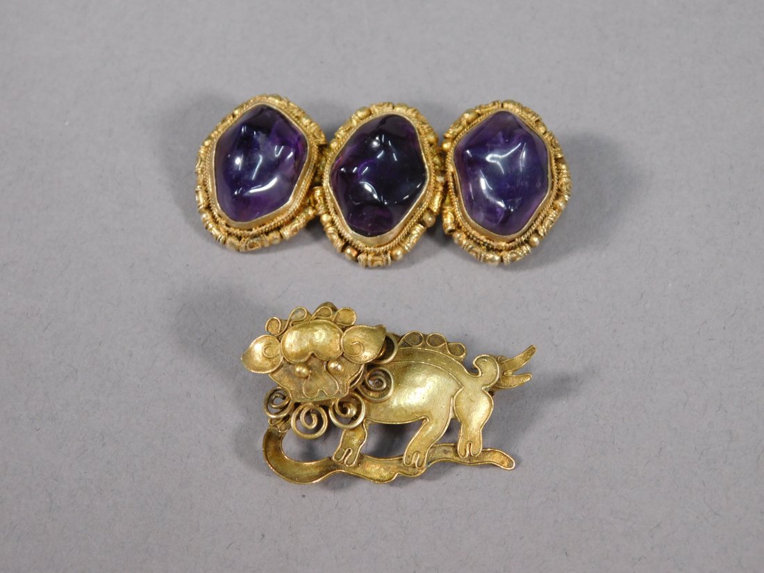 Antique Chinese Silver Vermeil Brooches: China, early 20th century. A charming little gold pin in the form of a Foo dog. 4.6 grams Length: 1.5 inches / 3.81 cm China, ca. Qing Dynasty. The three baroque form stones set into elaborate silver 