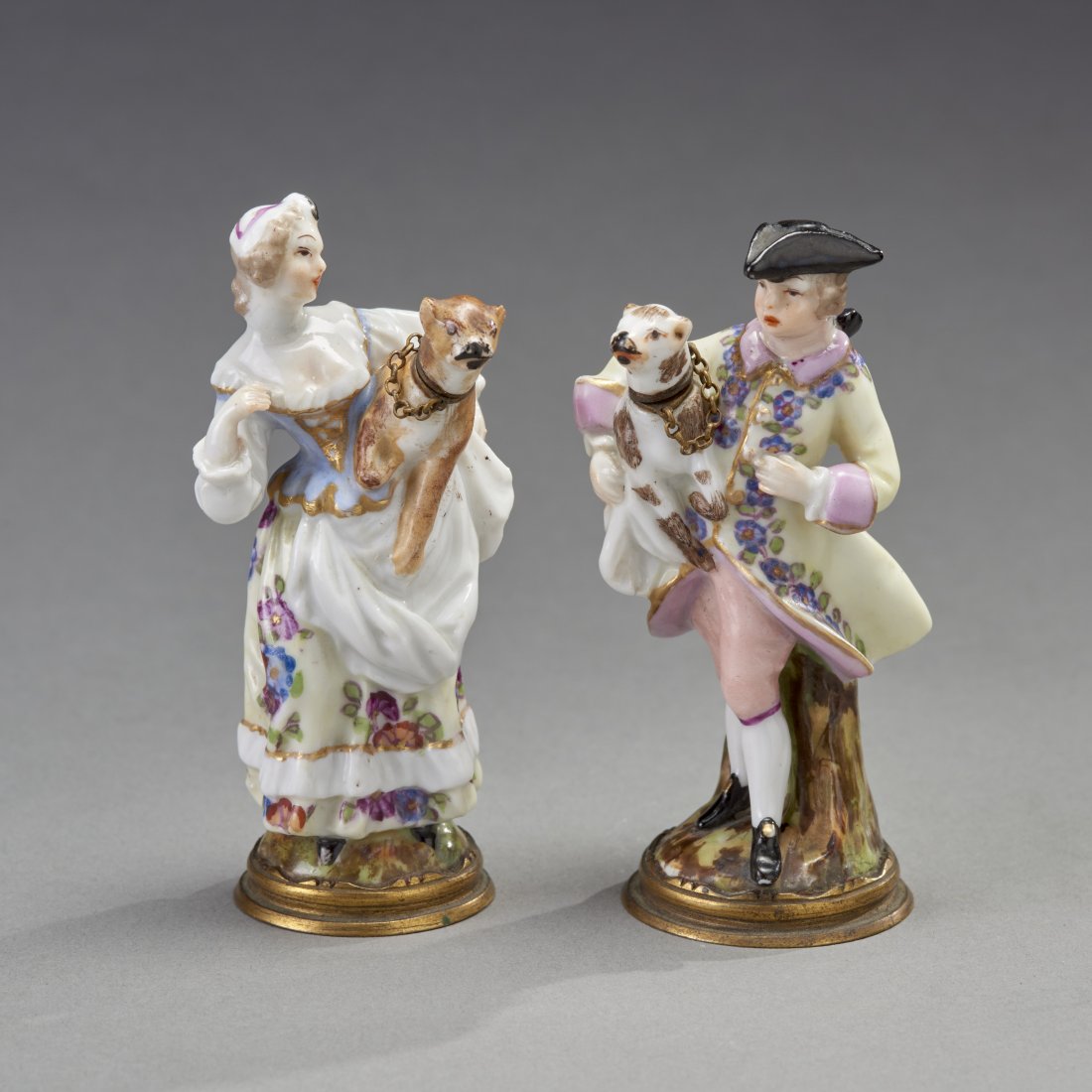 Two Meissen Figural Scent Bottles with Dogs: Meissen , ca. 19th century. Two figural scent bottles with mirrors on base, dog-head applicators are removable and attached with chains. Provenance: Old Connecticut estate. Height: 3.4 inches / 8.6 cm