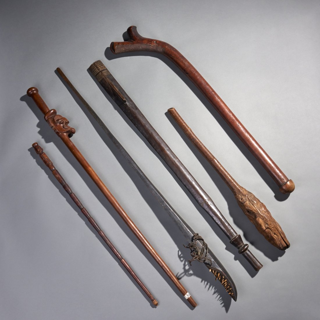 Six Ethnographic Clubs and Staffs: Melanesia and Polynesia, ca. 19th-early 20th century. Six clubs and staffs. Height of largest: 43.8 inches / 111.1 cm