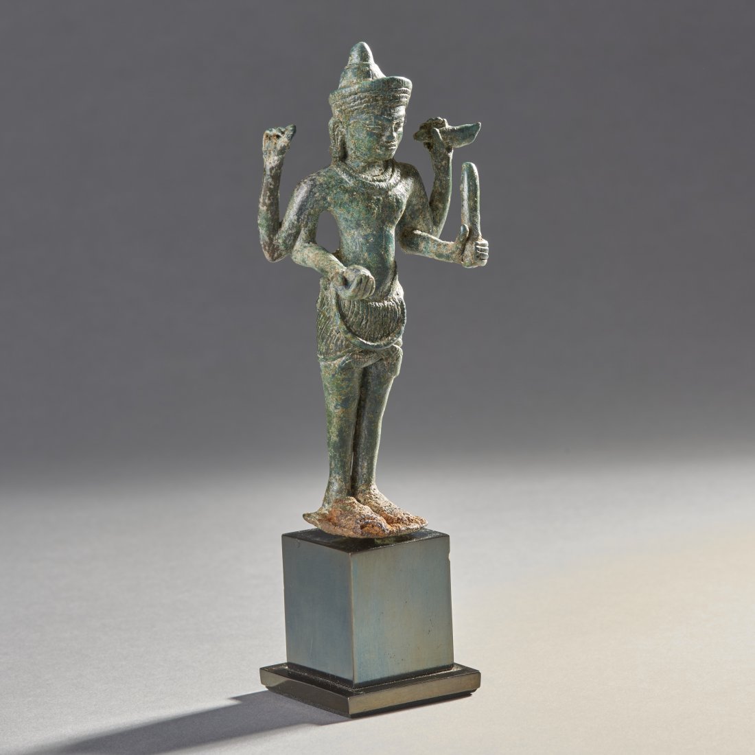Khmer Bronze Vishnu: Cambodia, ca. 12th century. Very nice Khmer bronze figure of Vishnu, with good detail and deep-green patina. Custom base. Height with stand: 6.5 inches / 16.5 cm