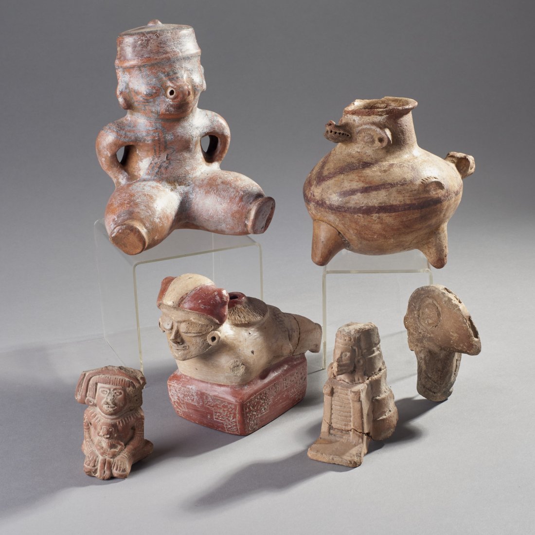 Six Pre-Columbian Objects: Central and South America, ca. 1st-early 2nd millennium AD. Height of tallest: 8.5 inches / 21.6 cm