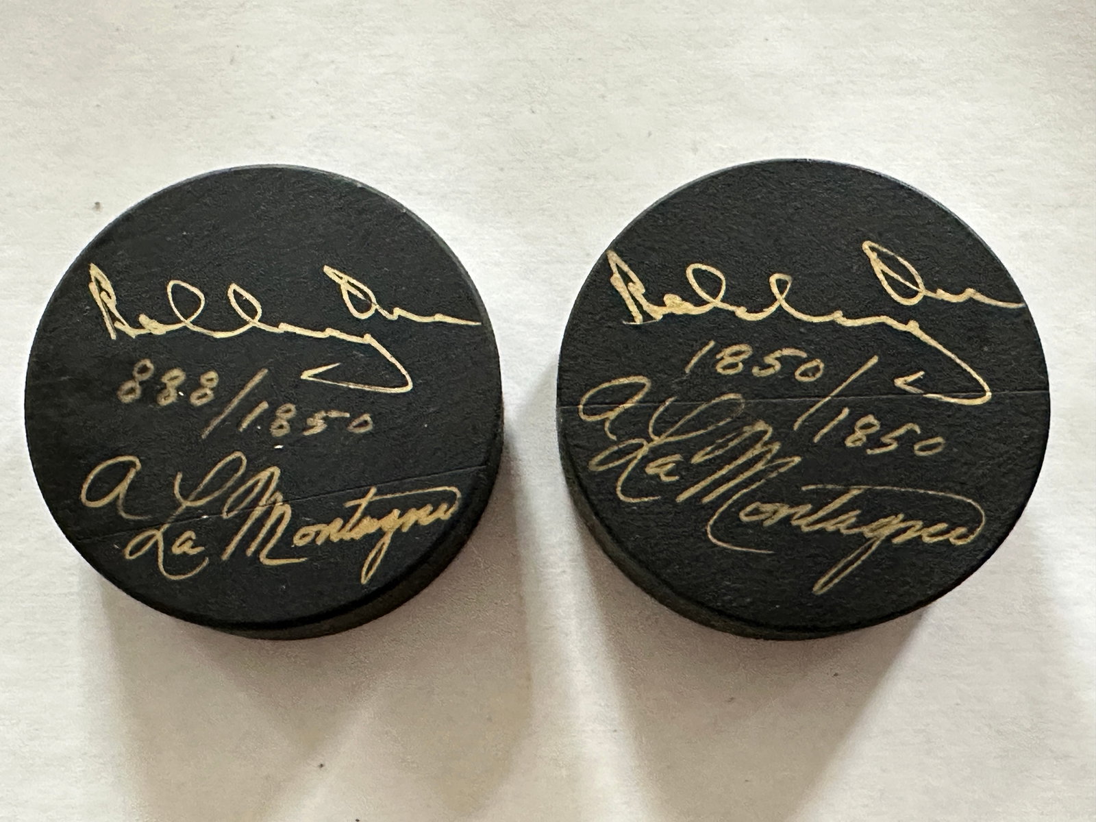 2 Bobby Orr Hockey Pucks (1 of 2)