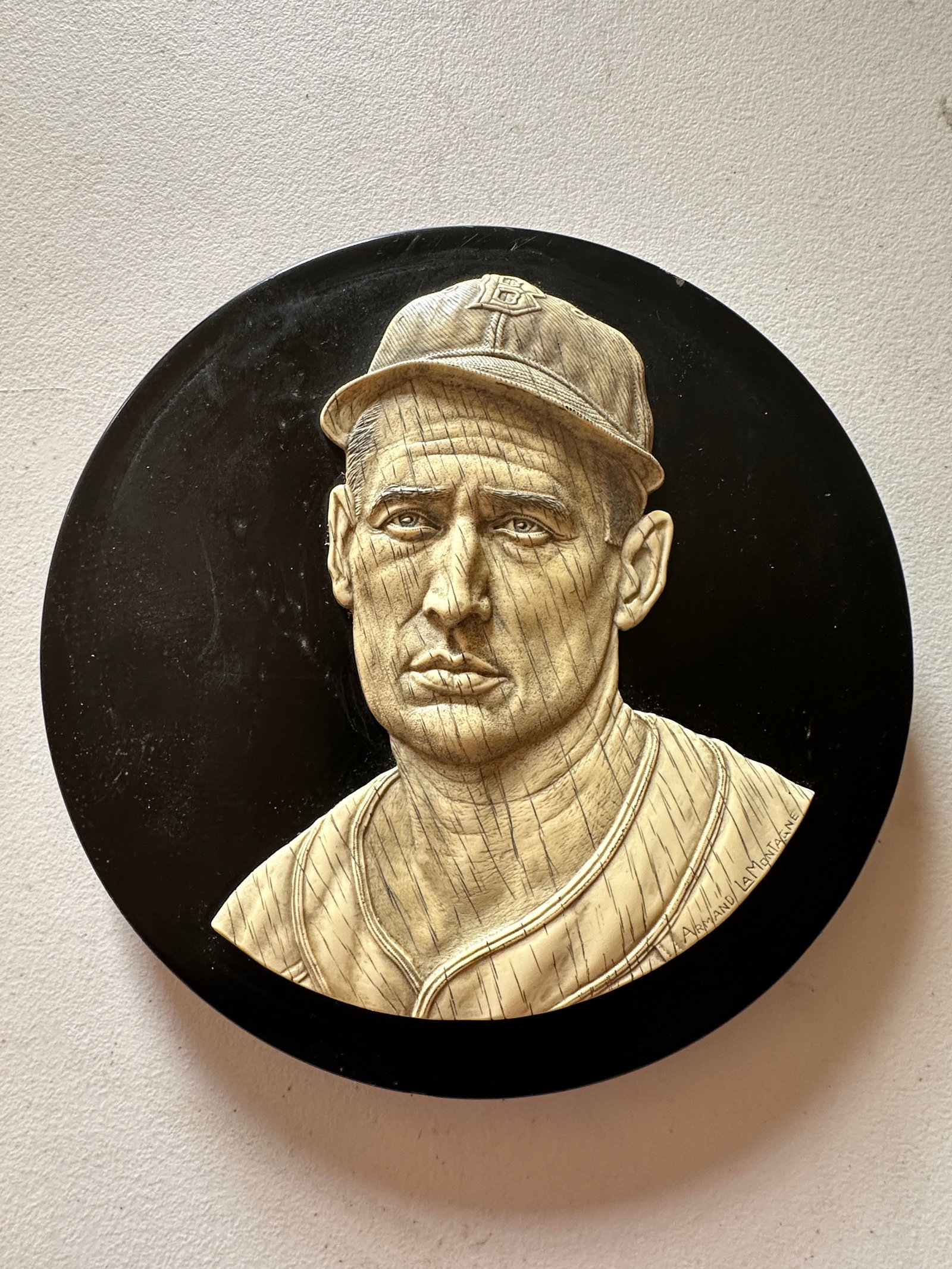 Ted Williams Relief: plastic, mounted on round board, signed stamped on reverse, 9 in. dia.