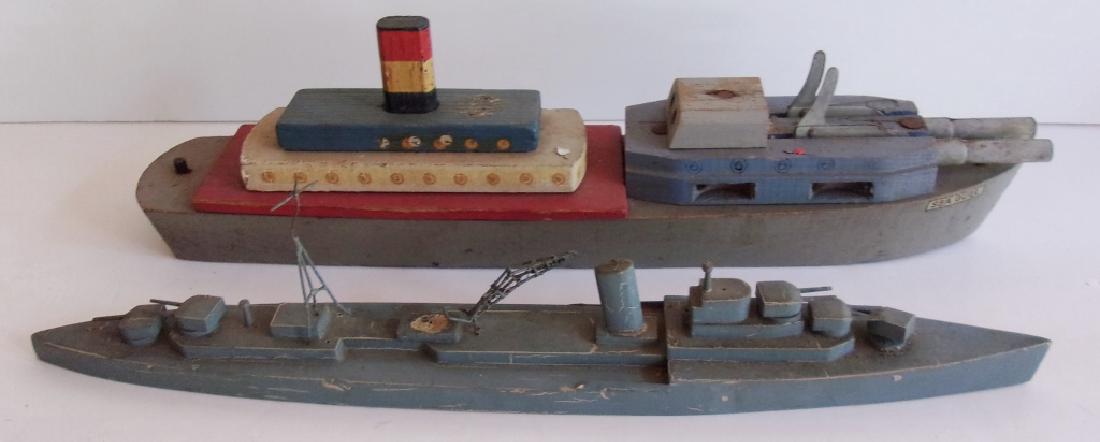 2 vintage military wood toy boats: 2 vintage military wood toy boats. Lacking pieces. Largest measures 14 inches x 4 inches.