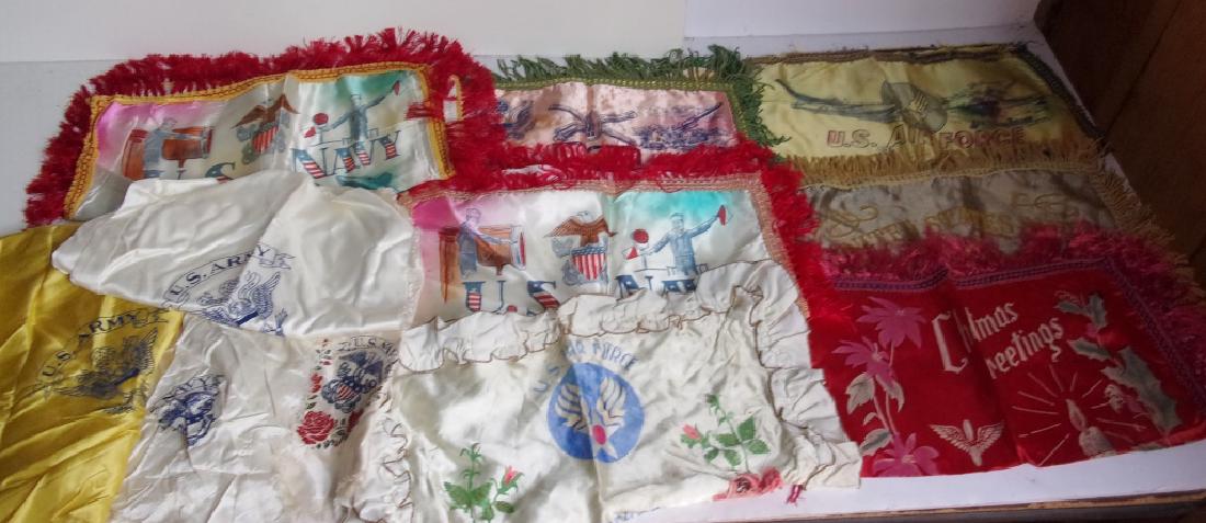11 piece military memorabilia lot: 11 piece military memorabilia lot including pillow covers and silk scarf/handkerchiefs.