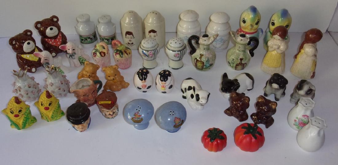 Collection of vintage salt & pepper shakers: Collection of vintage salt & pepper shakers, not all sets, including bears; corn; cows.