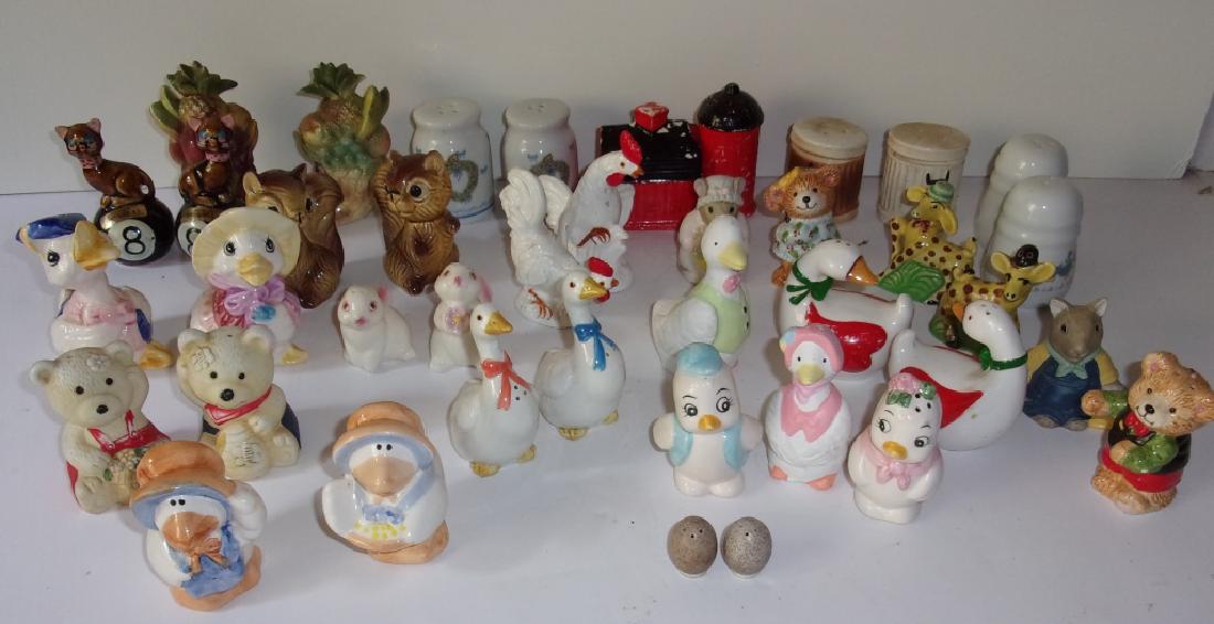 Collection of vintage salt & pepper shakers: Collection of vintage salt & pepper shakers, not all sets, including ducks; bears; cats.