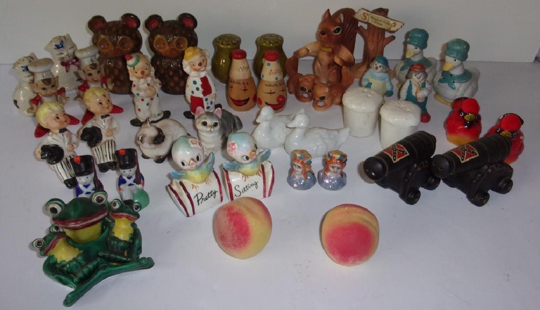 20 sets of vintage salt & pepper shakers: 20 sets of vintage salt & pepper shakers including ducks; clown; peaches; birds; cannons.