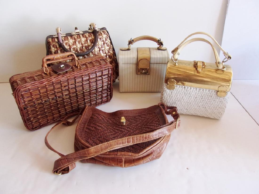 5 purses/pocket books: 5 purses/pocket books including Simon made in Hong Kong; Alan Edward made in China. Used condition; wear. Largest measures 10 inches x 9 inches.