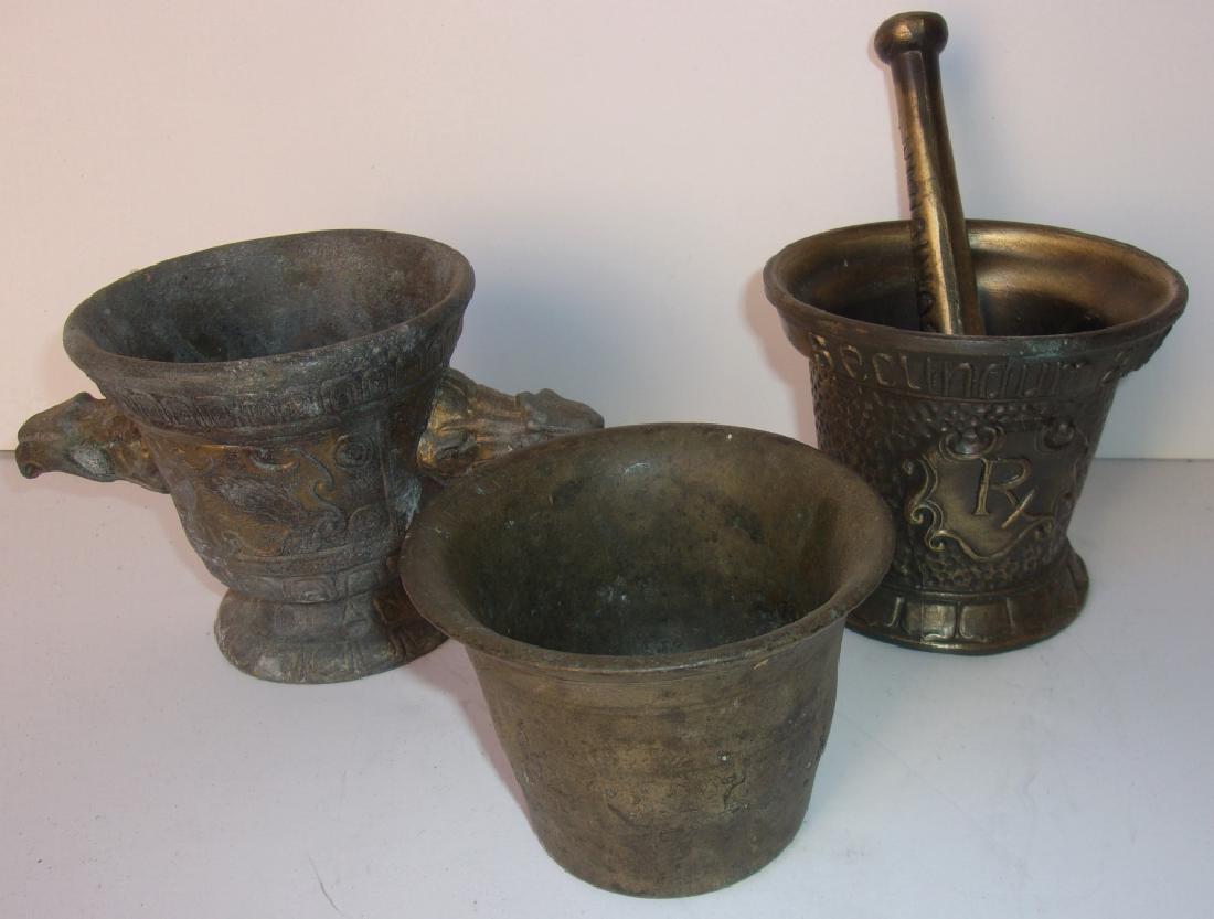 3 antique mortar and pestle: 3 antique mortar and pestle. Largest measures 4" x 4.5".