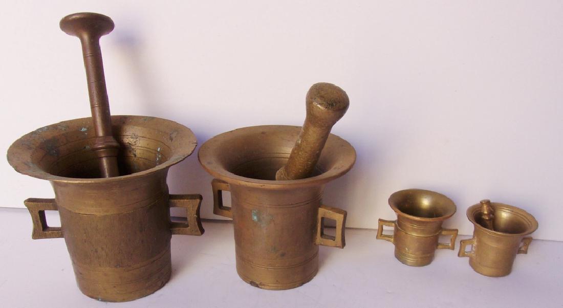 4 antique mortar and pestle: 4 antique mortar and pestle. Largest measures 4.5" x 5".