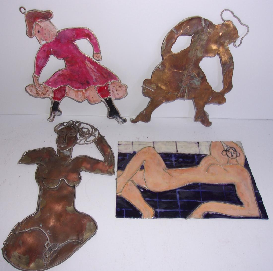 4 vintage handcrafted metal hanging displays: 4 vintage handcrafted metal hanging displays. Largest measures 7 1/2 inches high.