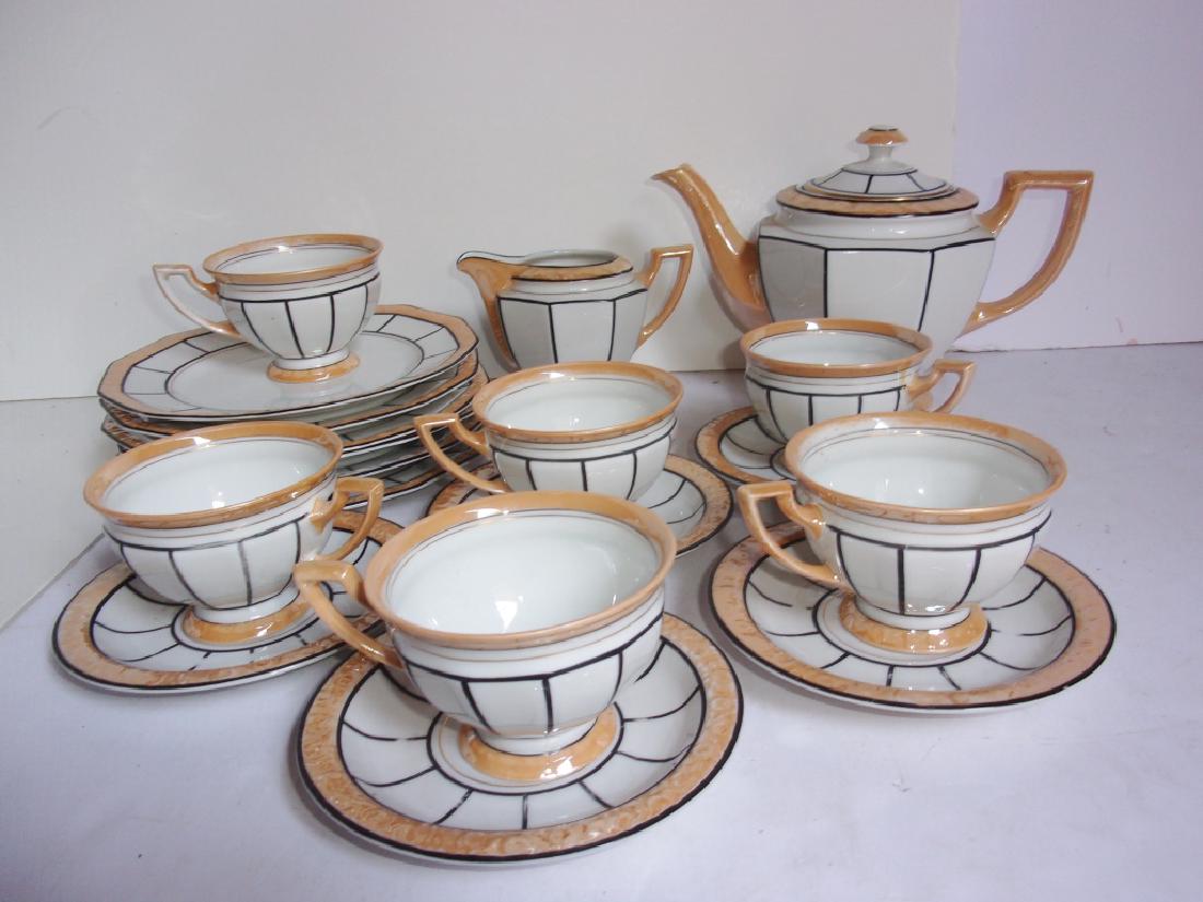 Rosenthal Bavaria teapot and plates: Rosenthal Bavaria teapot and plates Including 6 plates, 6 cups, 5 saucers, creamer, teapot. Not a complete set. Wear; hairline crack on one cup. Teapot measures 7" x 9".