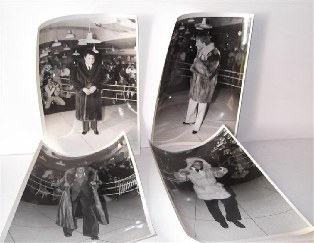 4 photographs of athletes modeling fur coats: 4 photographs of athletes modeling fur coats including Muhammad Ali, Arthur Ashe, Wayne Gretzky, possibly by AP photographer Legrand Leonardo at a fund raiser at the Felt Forum (Madison Square Garden)