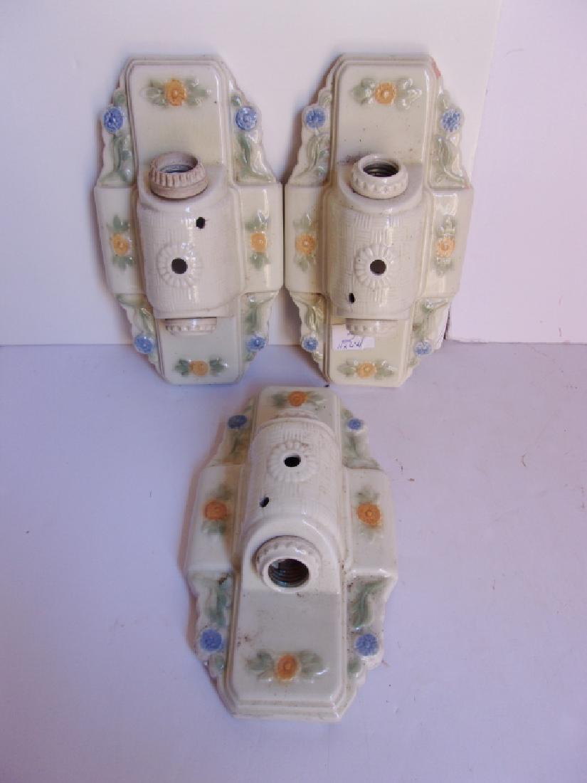 3 Art Deco porcelain wall light fixtures: 3 Art Deco porcelain wall light fixtures. Used condition. 11" x 6.25".