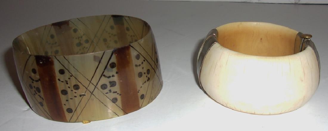 2 African in origin bracelets: 2 African in origin bracelets including 1 vintage horn and 1 antique bone.