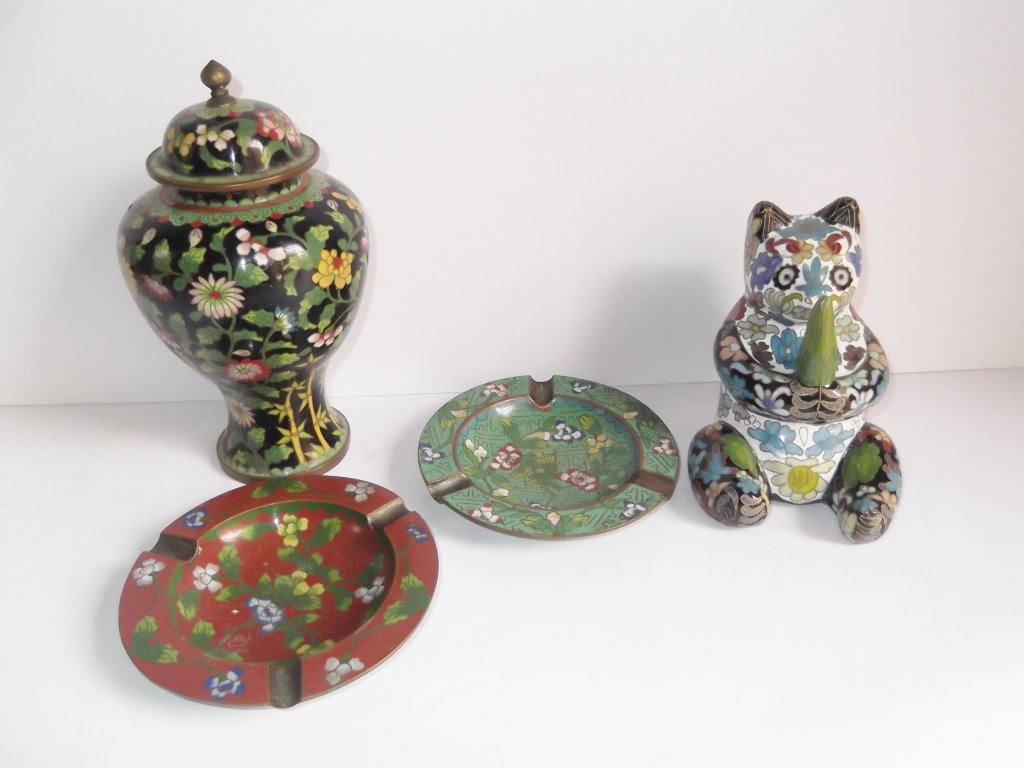 4 piece Vintage cloisonne lot: 4 piece Vintage cloisonne lot including urn, panda, ashtrays. Chips. Largest measures 8 inches high.