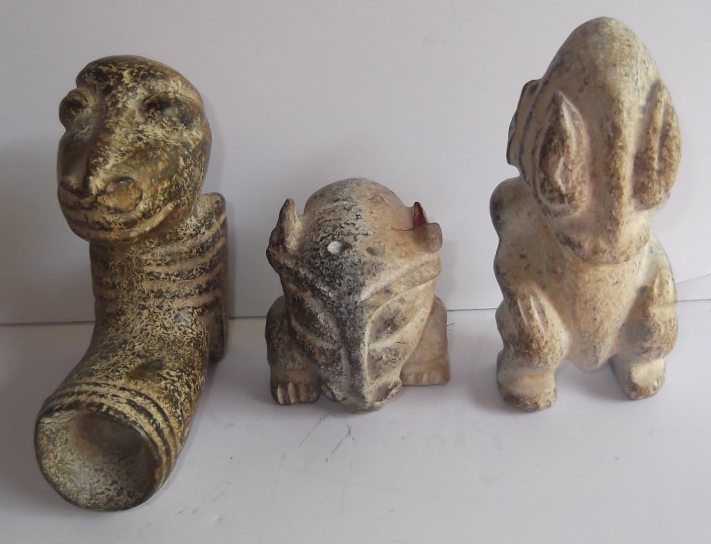 3 carved stone figures (1 of 8)