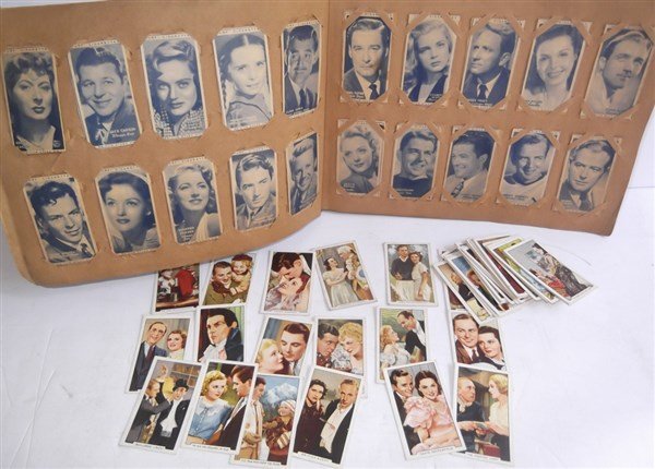 132 cigarette film star collector cards: 100 Turf cigarette film favorite collector cards & 32 Famous Film Scenes cigarette collector cards. Album not complete. Stains; foxing; minor edge tears.