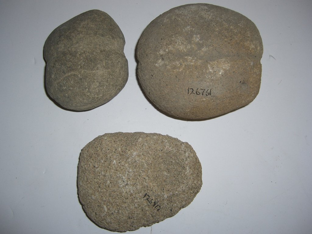 3 primitive stones: 3 war club heads de-accessioned Columbia University, excavated early 20th c. 4 inches x 2 inches.