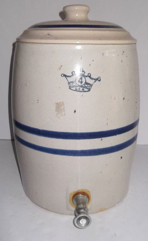 4 Gallon CROWN Blue Stripe Crock: 4 Gallon CROWN Blue Stripe Crock with Spigot and Cover. Several Chips; stains. Top not original. Bottom marked RRP Co. U.S.A. Roseville, O. (Ohio).