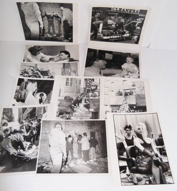 11 black & white news photos: 11 black & white news photos of man rescued from fire; car accident; police lineup. 11 inches x 8 1/2 inches.