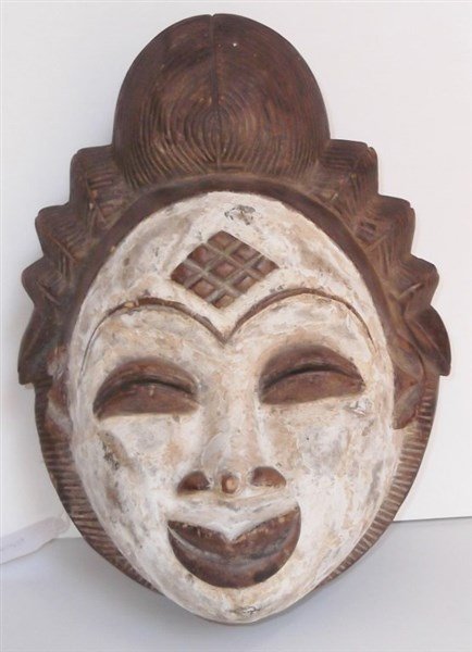 African mask: Vintage Puna Ghost mask, Gabon West Central Africa. Chipped ear; scratches. 13 1/2 inches high x 10 inches wide.