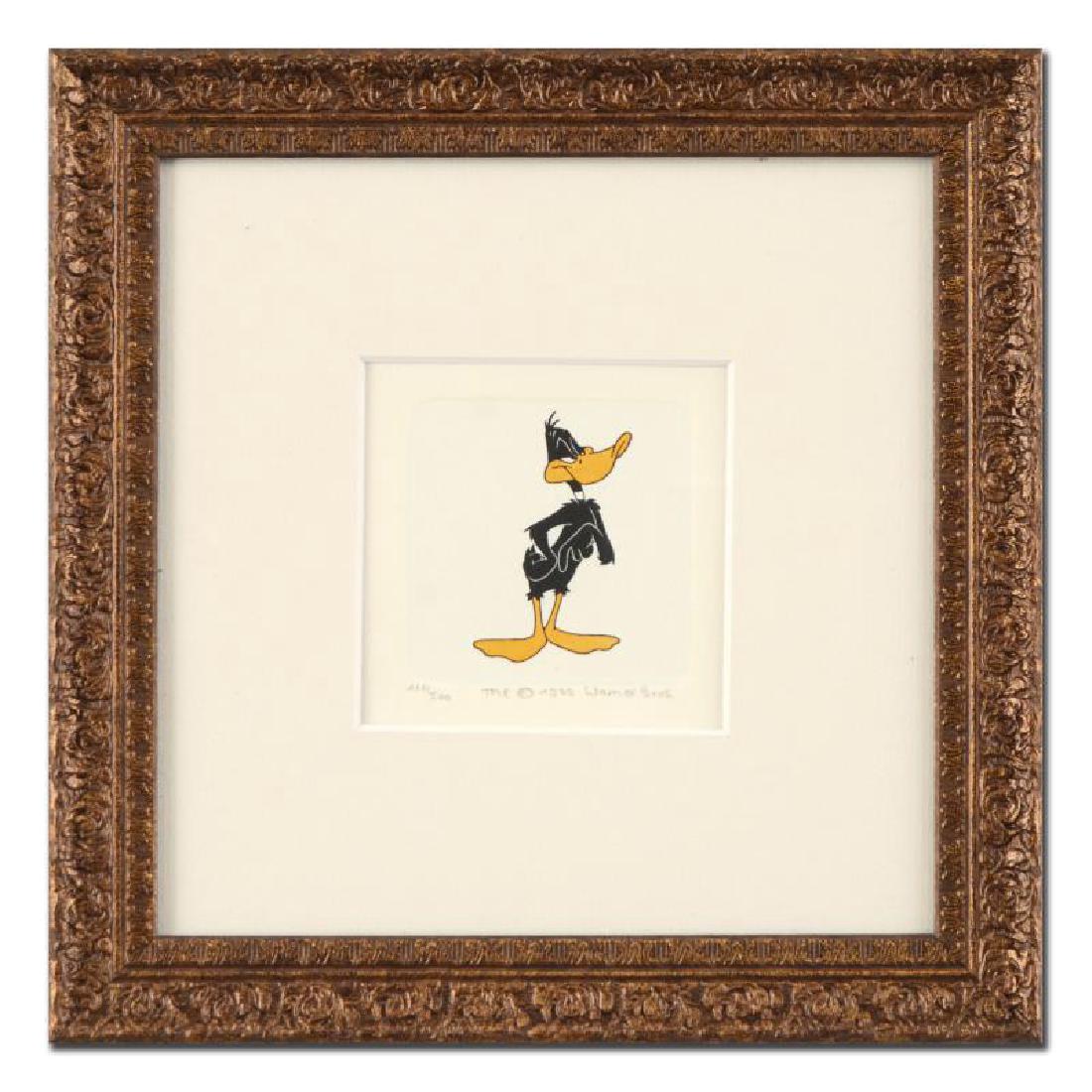 "Daffy Duck" Framed Limited Edition Etching with: "Daffy Duck" is a limited edition etching on paper with hand-tinted coloring from Warner Bros, numbered and dated 1999. This piece comes framed. Measures approx. 9" x 9" (with frame), 1.5" x 2" (image