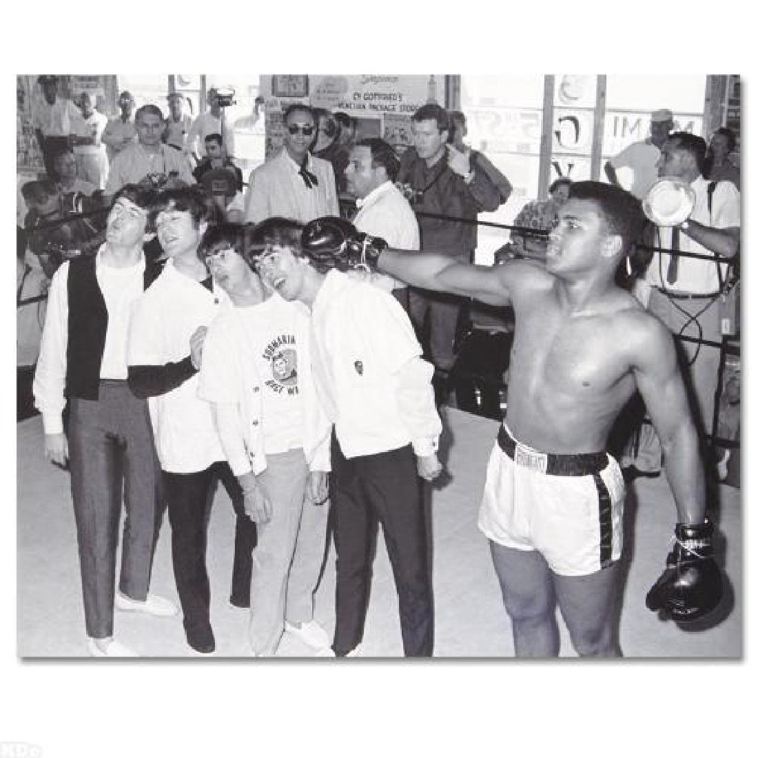 Muhammad Ali! Licensed Photograph of the Heavyweight: Own a piece of sports history with this Muhammad Ali and Beatles photo. Taken at the peak of his success as one of the greatest heavyweight championship boxers of all time, this photo is sure to compl