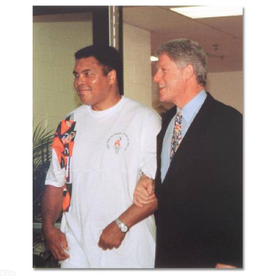 Muhammad Ali! Licensed Photograph of the Heavyweight: Own a piece of sports history with this Muhammad Ali and Bill Clinton photo. Taken at the peak of his fame as one of the greatest heavyweight championship boxers of all time, this photo is sure to com
