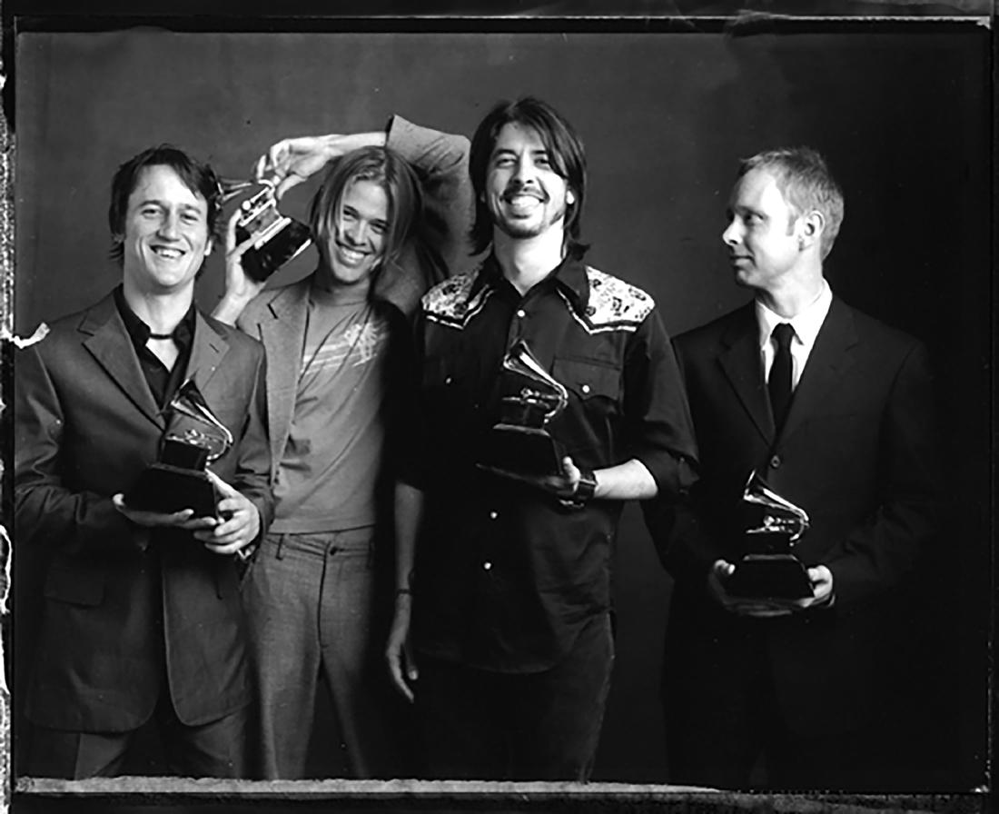 Foo Fighters Posing with their Grammy\'s: Foo Fighters Posing with their Grammy's. Great Photo from Danny Clinch's Famous Collection of Images Shot During the Grammy's. nnDanny Clinch loves music. He listens to it, plays it, photographs it, a